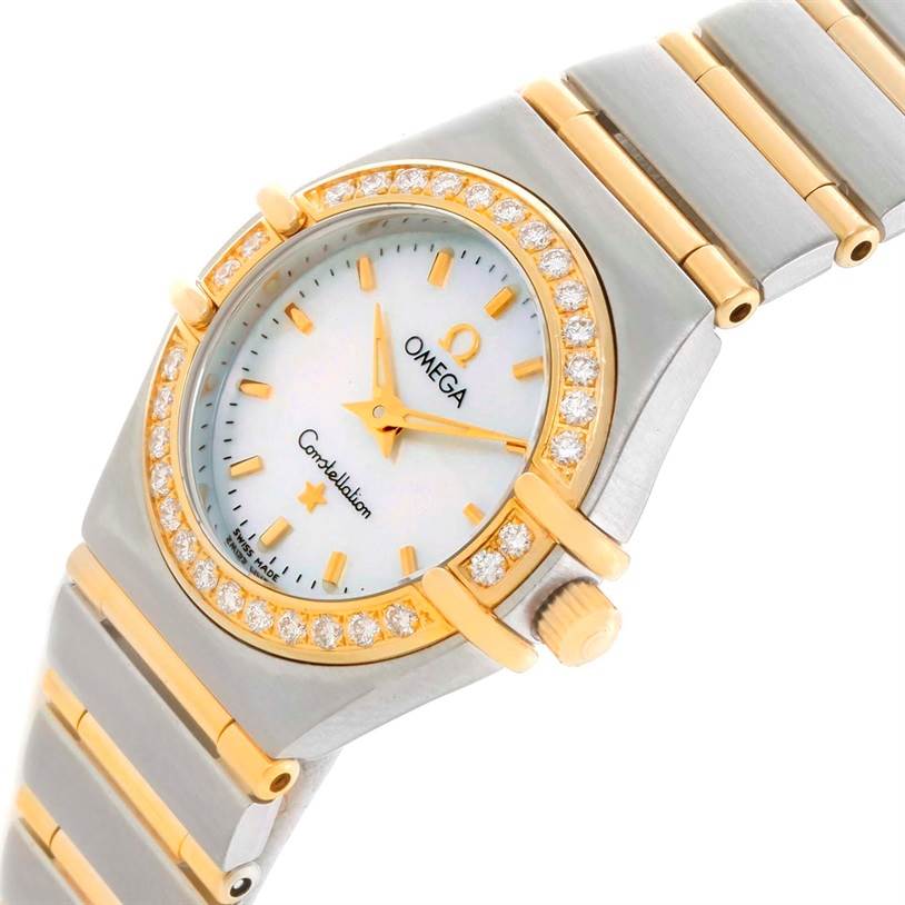 The Omega 1267.70.00 Women
s Steel and Gold (two tone) Mother of Pearl Dial 1267.70.00 Women
s Steel and Gold (two tone) Mother of Pearl Dial Constellation My Choice Mini Steel Gold Diamond Watch 1267.70.00 is shown at an angle, highlighting the face, bezel, and bracelet.