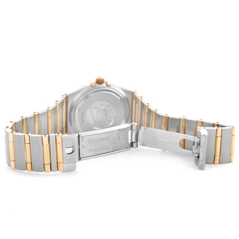 The image shows the back and open clasp of the Omega 1267.70.00 Women
s Steel and Gold (two tone) Mother of Pearl Dial 1267.70.00 Women
s Steel and Gold (two tone) Mother of Pearl Dial Constellation My Choice Mini Steel Gold Diamond Watch 1267.70.00.