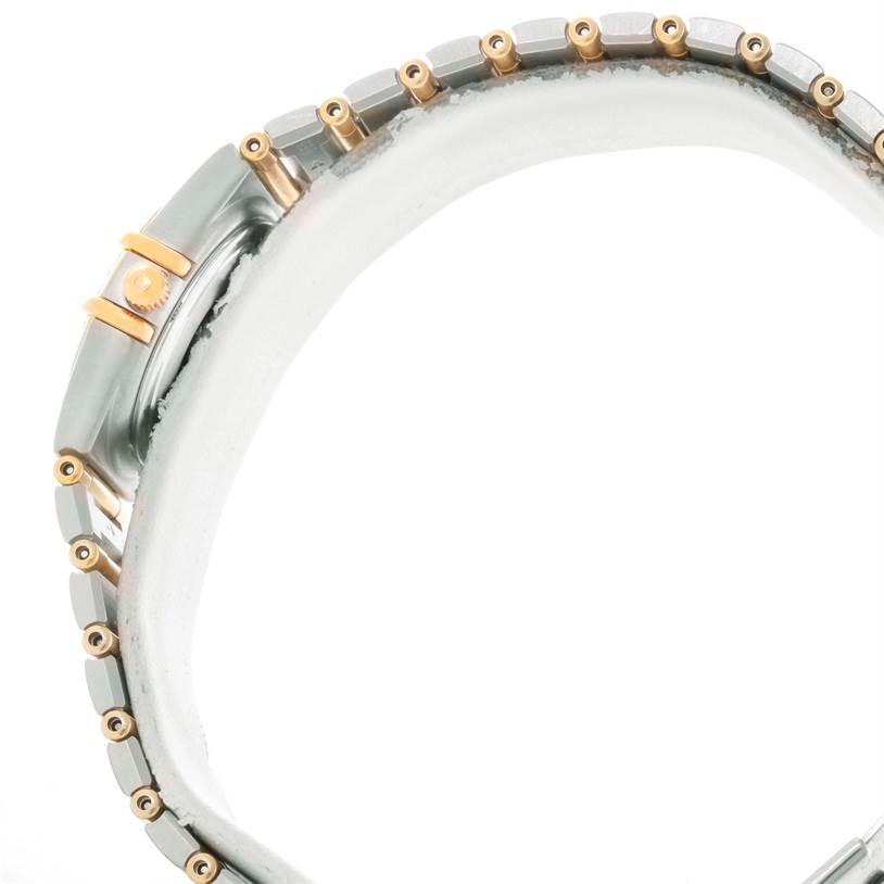 The image shows a side angle of the Omega 1267.70.00 Women
s Steel and Gold (two tone) Mother of Pearl Dial 1267.70.00 Women
s Steel and Gold (two tone) Mother of Pearl Dial Constellation My Choice Mini Steel Gold Diamond Watch 1267.70.00, highlighting the band and side of the case.