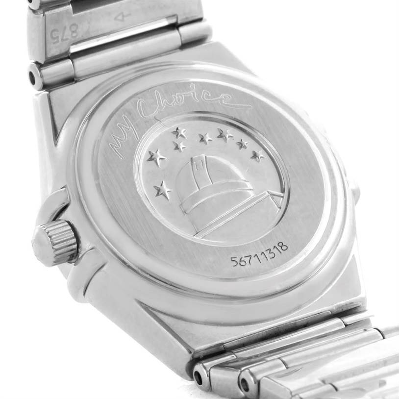 The image shows the back case and part of the bracelet of the Omega 1465.71.00 Women
s Stainless Steel Mother of Pearl Dial 1465.71.00 Women
s Stainless Steel Mother of Pearl Dial Constellation My Choice Mini Diamond Steel Watch 1465.71.00.