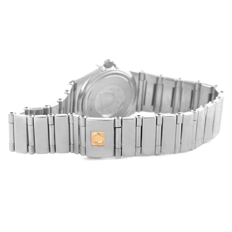 The image shows the back and part of the bracelet of the Omega 1465.71.00 Women
s Stainless Steel Mother of Pearl Dial 1465.71.00 Women
s Stainless Steel Mother of Pearl Dial Constellation My Choice Mini Diamond Steel Watch 1465.71.00.