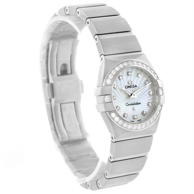 The image shows an Omega 123.15.27.60.55.002 Women
s Stainless Steel Mother of Pearl Dial 123.15.27.60.55.002 Women
s Stainless Steel Mother of Pearl Dial Constellation 27mm Diamond Ladies Watch model 123.15.27.60.55.002 from a front-left angle, highlighting the dial, bezel, and bracelet.