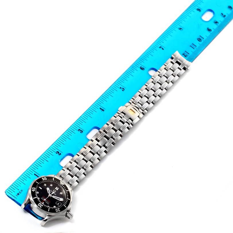 The Omega 212.30.28.61.51.001 Women
s Stainless Steel Black Dial 212.30.28.61.51.001 Women
s Stainless Steel Black Dial Seamaster Professional Diamond Ladies Watch 212.30.28.61.51.001 is shown from a top-down angle with its bracelet extended.