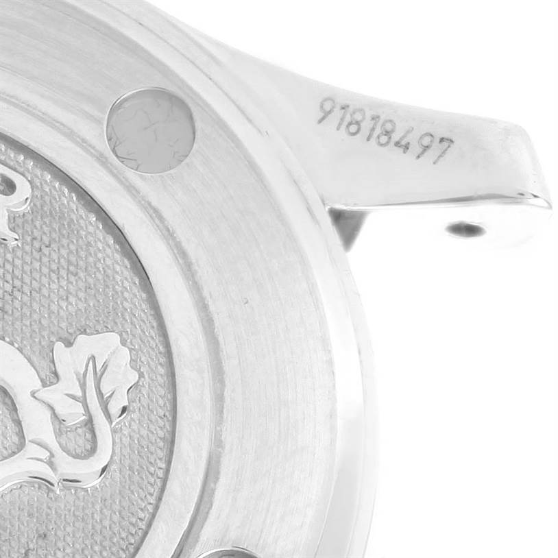 This image shows a close-up of the case back and serial number of the Omega 212.30.28.61.51.001 Women
s Stainless Steel Black Dial 212.30.28.61.51.001 Women
s Stainless Steel Black Dial Seamaster Professional Diamond Ladies Watch, model 212.30.28.61.51.001.