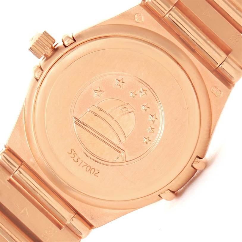 The image shows the back case and part of the bracelet of the Omega 1167.75.00 Women's Rose Gold Mother of Pearl Dial 1167.75.00 Women's Rose Gold Mother of Pearl Dial Constellation 95 18K Rose Gold Diamond Watch 1167.75.00.