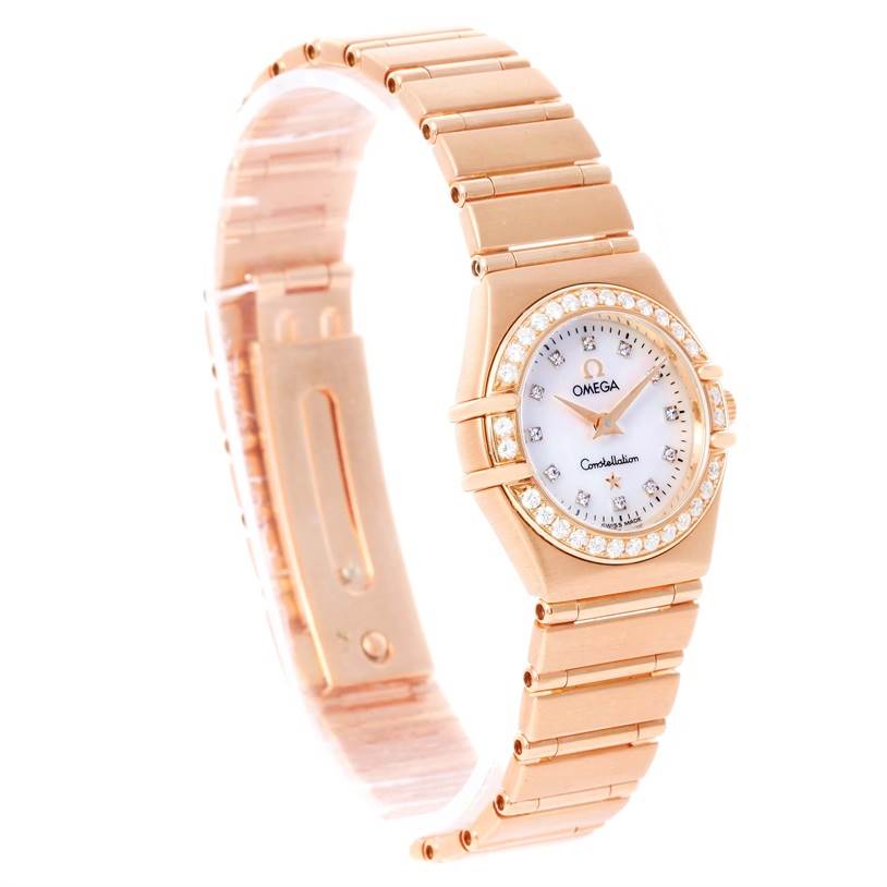 The image shows an Omega 1167.75.00 Women's Rose Gold Mother of Pearl Dial 1167.75.00 Women's Rose Gold Mother of Pearl Dial Constellation 95 18K Rose Gold Diamond Watch 1167.75.00 from a three-quarter angle, highlighting the face, bezel, and bracelet.