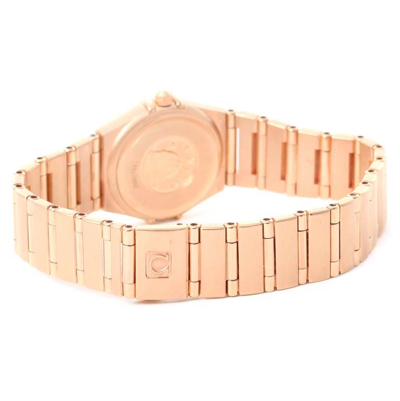 The image shows the back and bracelet of the Omega 1167.75.00 Women's Rose Gold Mother of Pearl Dial 1167.75.00 Women's Rose Gold Mother of Pearl Dial Constellation 95 18K Rose Gold Diamond Watch 1167.75.00.
