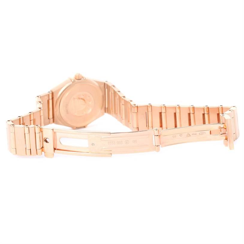 The image shows the open bracelet and case back of the Omega 1167.75.00 Women's Rose Gold Mother of Pearl Dial 1167.75.00 Women's Rose Gold Mother of Pearl Dial Constellation 95 18K Rose Gold Diamond Watch 1167.75.00.