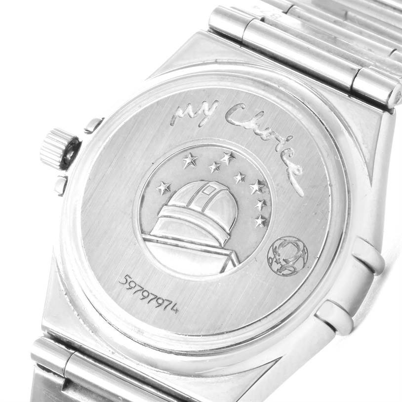 The image shows the back case engraving and part of the bracelet of the Omega 1475.51.00 Women
s Stainless Steel Black Dial 1475.51.00 Women
s Stainless Steel Black Dial Constellation My Choice Ladies Diamond Watch 1475.51.00.