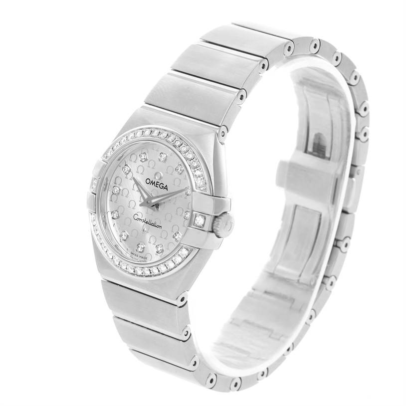 The image shows the Omega 123.15.27.60.52.001 Women
s Stainless Steel Silver Dial 123.15.27.60.52.001 Women
s Stainless Steel Silver Dial Constellation 27mm Diamond Ladies Watch 123.15.27.60.52.001 at a three-quarter angle, displaying the face, bezel, and bracelet.