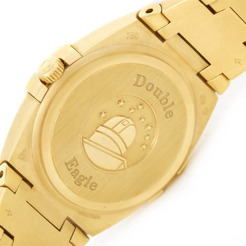 This image shows the back case and part of the bracelet of the Omega 1189.75.00 Women
s Yellow Gold Mother of Pearl Dial 1189.75.00 Women
s Yellow Gold Mother of Pearl Dial Constellation Double Eagle Yellow Gold Diamond Watch 1189.75.00.