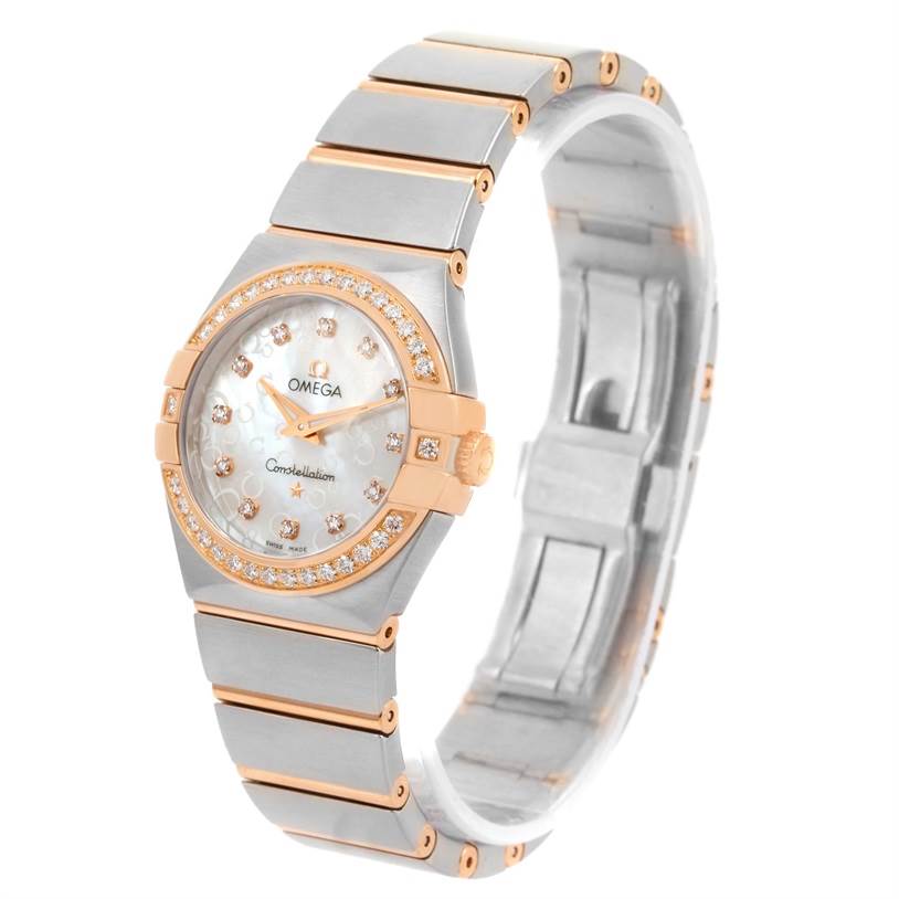 The image shows an Omega 123.25.27.60.55.009 Women
s Steel and Gold (two tone) Mother of Pearl Dial 123.25.27.60.55.009 Women
s Steel and Gold (two tone) Mother of Pearl Dial Constellation Diamond Steel Rose Gold Watch 123.25.27.60.55.009 from a tilted front angle, displaying the dial, bezel, and bracelet.