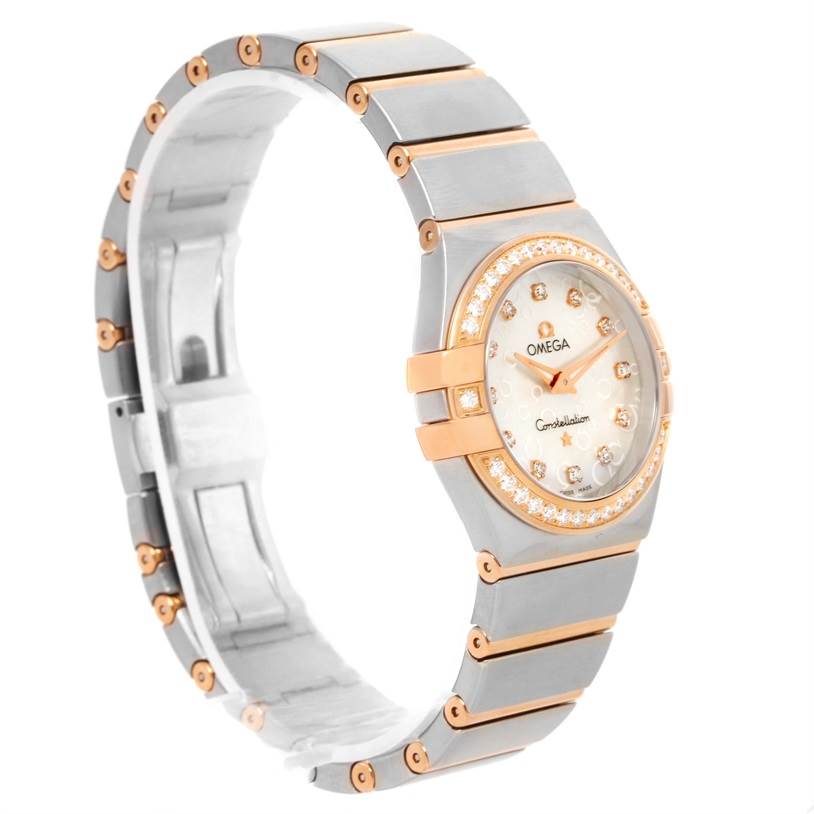 The Omega 123.25.27.60.55.009 Women
s Steel and Gold (two tone) Mother of Pearl Dial 123.25.27.60.55.009 Women
s Steel and Gold (two tone) Mother of Pearl Dial Constellation Diamond Steel Rose Gold Watch 123.25.27.60.55.009 is shown at a side angle highlighting its bracelet and face.