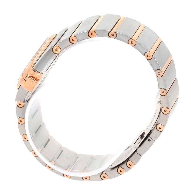 The image shows a side view of the Omega 123.25.27.60.55.009 Women
s Steel and Gold (two tone) Mother of Pearl Dial 123.25.27.60.55.009 Women
s Steel and Gold (two tone) Mother of Pearl Dial Constellation Diamond Steel Rose Gold Watch 123.25.27.60.55.009 focusing on its bracelet.