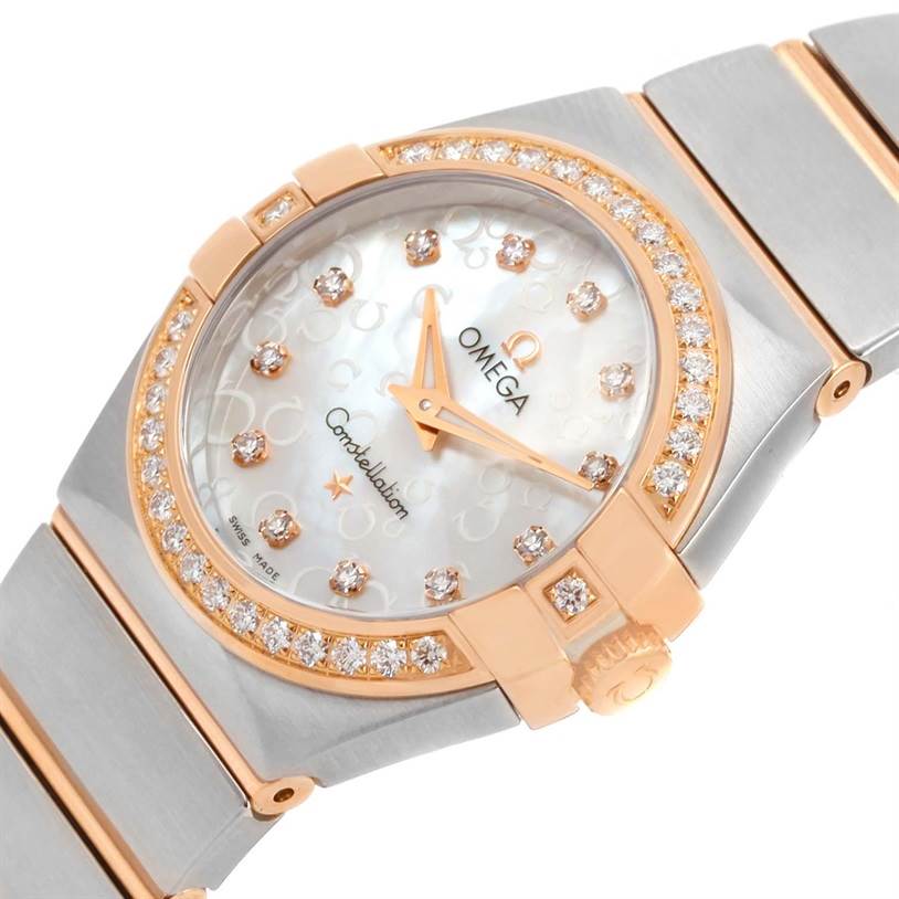The Omega 123.25.27.60.55.009 Women
s Steel and Gold (two tone) Mother of Pearl Dial 123.25.27.60.55.009 Women
s Steel and Gold (two tone) Mother of Pearl Dial Constellation Diamond Steel Rose Gold Watch 123.25.27.60.55.009 is shown at an angle displaying the face, bezel, and part of the bracelet.