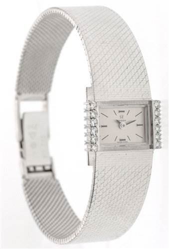 The image shows a side angle view of the Omega Women's White Gold Silver Dial Women's White Gold Silver Dial Vintage Ladies 18k Gold with Diamonds watch, highlighting its bracelet and watch face.