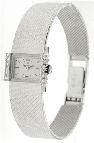 The image shows a side and slightly top angle of the Vintage Ladies 18k White Gold with Diamonds model by Omega Women's White Gold Silver Dial Women's White Gold Silver Dial, displaying its band and face.