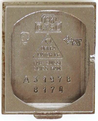 This image shows the interior case back of a Vintage Ladies 18k Gold with Diamonds watch by Omega Women's White Gold Silver Dial Women's White Gold Silver Dial, displaying model and manufacturing details.