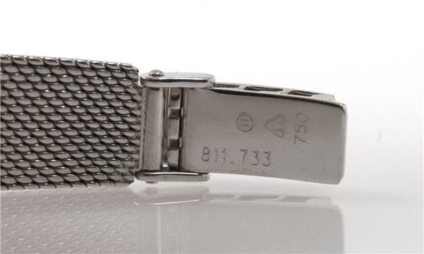 This image shows the clasp and part of the bracelet for the Vintage Ladies 18k Gold with Diamonds Omega Women's White Gold Silver Dial Women's White Gold Silver Dial watch.