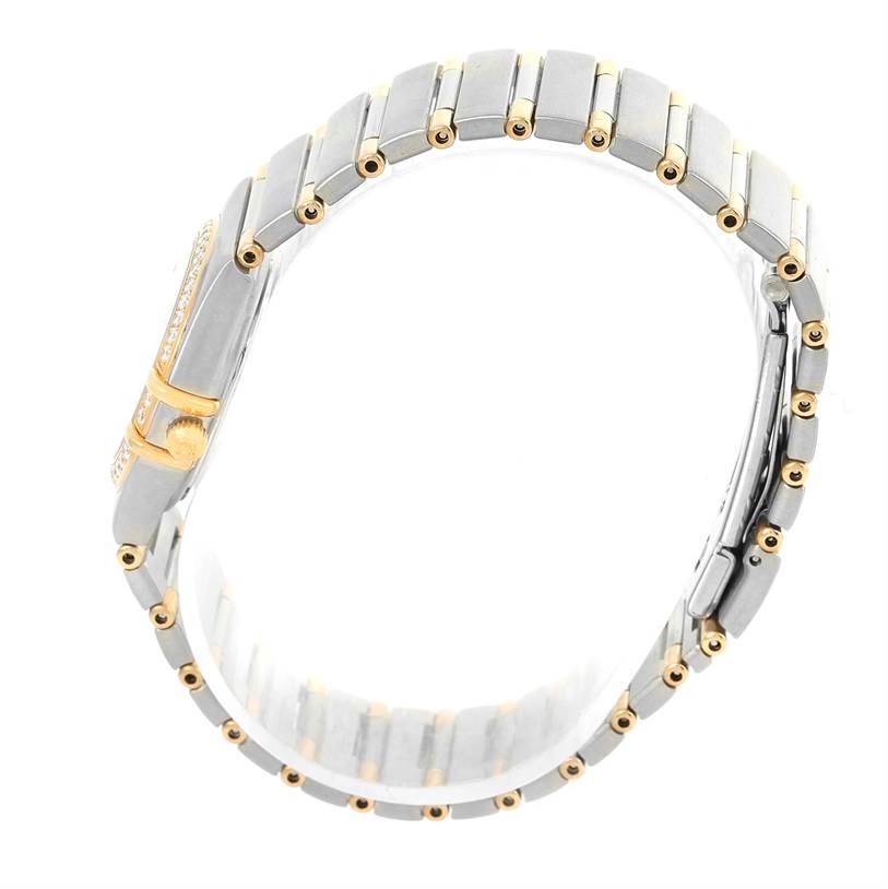 The image shows a side view of the Omega 1376.75.00 Women
s Steel and Gold (two tone) Mother of Pearl Dial 1376.75.00 Women
s Steel and Gold (two tone) Mother of Pearl Dial Constellation My Choice Steel Yellow Gold Diamond Watch 1376.75.00, highlighting its bracelet and clasp.