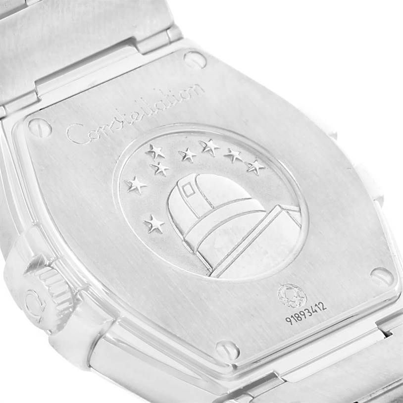 The image shows the back case of the Omega 123.15.27.60.51.001 Women's Stainless Steel Black Dial 123.15.27.60.51.001 Women's Stainless Steel Black Dial Constellation 27mm Diamond Watch 123.15.27.60.51.001 Unworn model with engraved details.