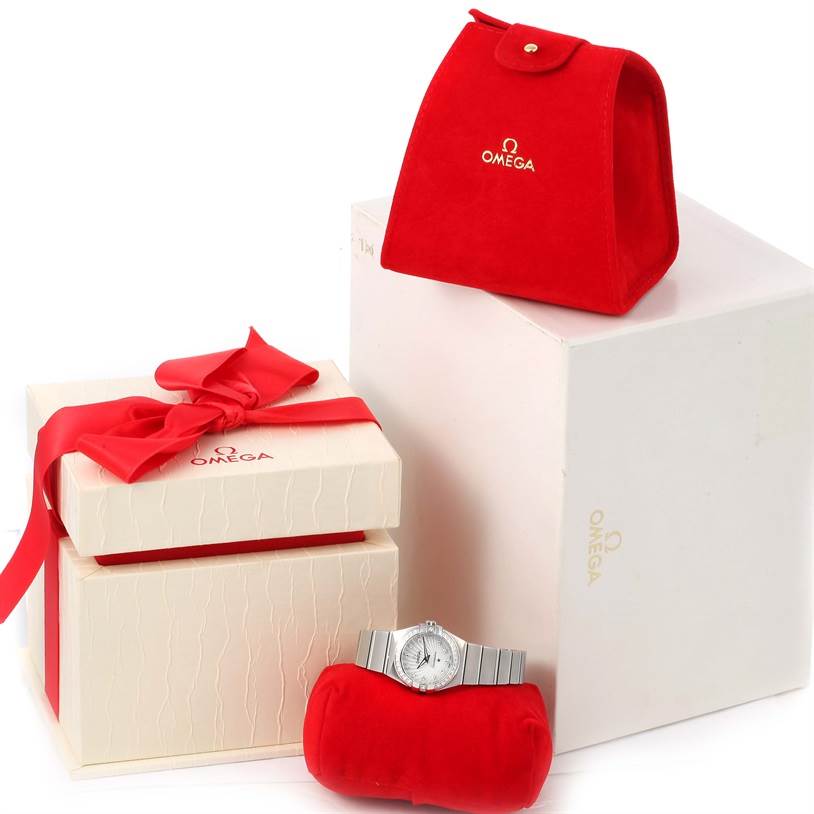 The Omega 123.15.24.60.55.004 Women
s Stainless Steel Mother of Pearl Dial 123.15.24.60.55.004 Women
s Stainless Steel Mother of Pearl Dial Constellation Diamond Ladies Watch 123.15.24.60.55.004 is shown with its red and white packaging and display.