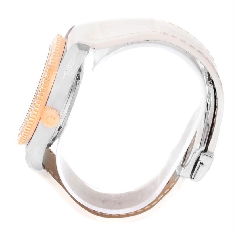 The image shows a side view of the Omega 222.28.42.20.04.001 Women's Steel and Gold (two tone) White Dial 222.28.42.20.04.001 Women's Steel and Gold (two tone) White Dial Seamaster Planet Ocean 42 mm Diamond Watch 222.28.42.20.04.001, highlighting the crown and part of the strap.