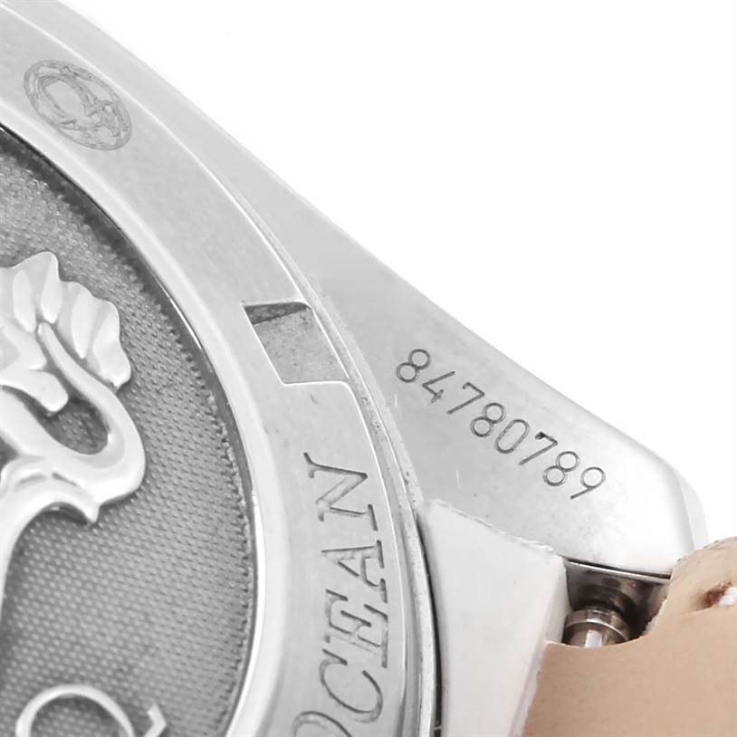 This image shows a close-up angle of the Omega 222.28.42.20.04.001 Women's Steel and Gold (two tone) White Dial 222.28.42.20.04.001 Women's Steel and Gold (two tone) White Dial Seamaster Planet Ocean 42 mm Diamond Watch 222.28.42.20.04.001, highlighting the casing and part of the serial number.