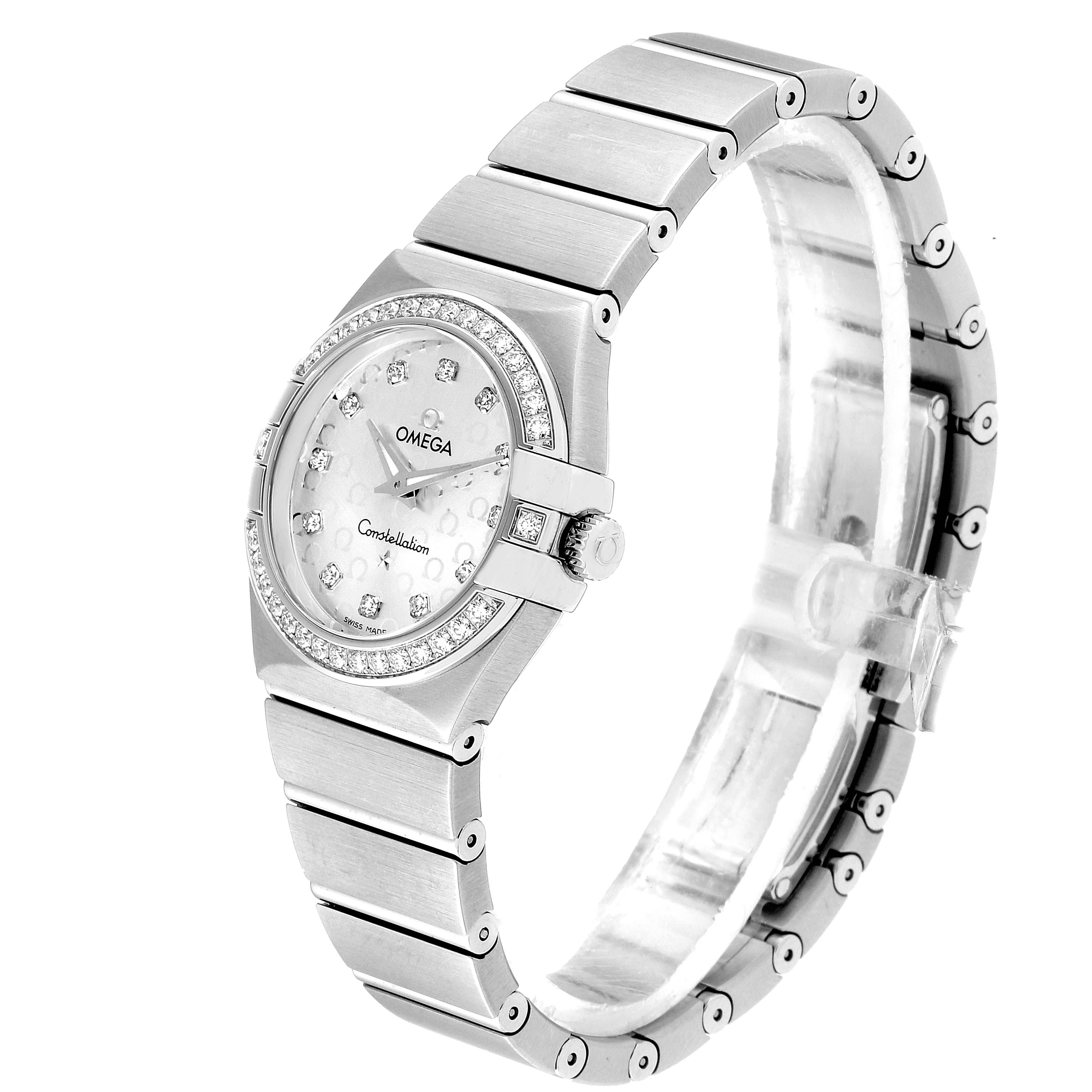 The image shows an Omega 123.15.27.60.52.001 Women's Stainless Steel Silver Dial 123.15.27.60.52.001 Women's Stainless Steel Silver Dial Constellation 27mm Diamond Ladies Watch 123.15.27.60.52.001 at a three-quarter angle, highlighting the bracelet and face.