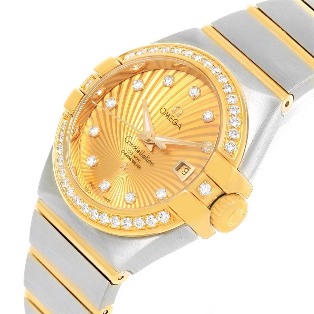 The image displays a side angle of the Omega 123.25.31.20.58.001 Women
s Steel and Gold (two tone) Champagne Dial 123.25.31.20.58.001 Women
s Steel and Gold (two tone) Champagne Dial Constellation 31 Co-Axial Diamond Ladies Watch 123.25.31.20.58.001, showing the face, bezel, and part of the bracelet.