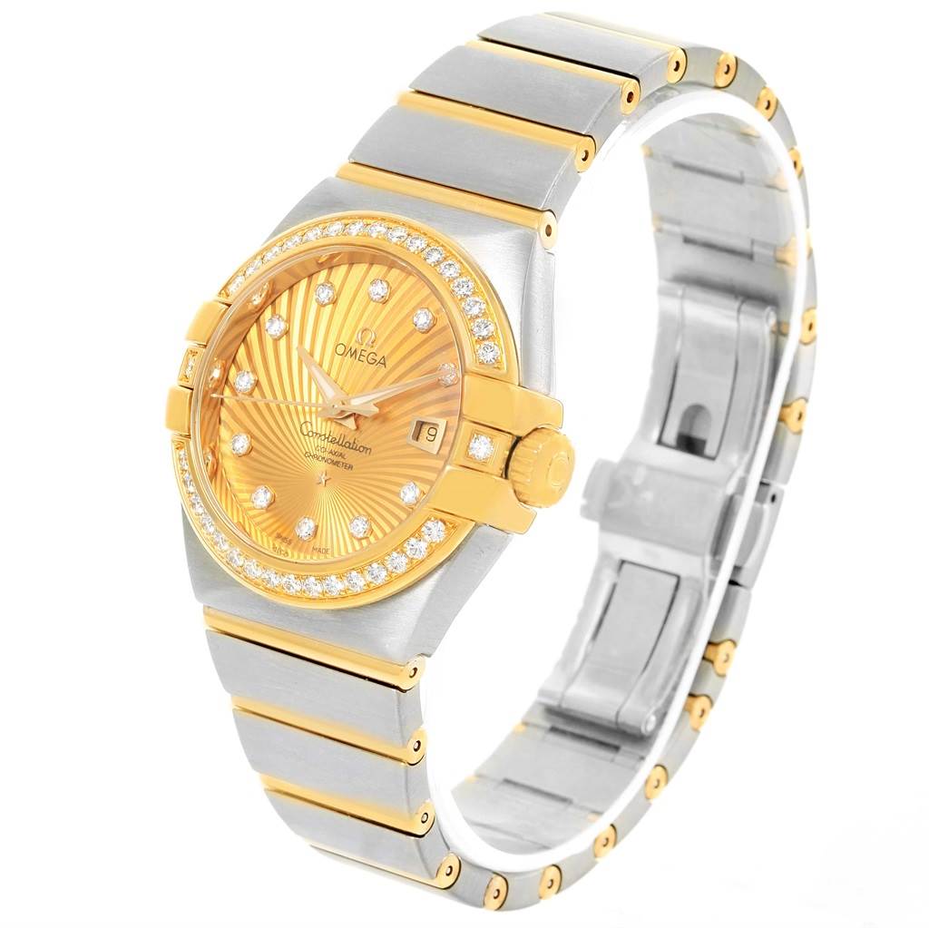 This image shows the front and side view of an Omega 123.25.31.20.58.001 Women
s Steel and Gold (two tone) Champagne Dial 123.25.31.20.58.001 Women
s Steel and Gold (two tone) Champagne Dial Constellation 31 Co-Axial Diamond Ladies Watch 123.25.31.20.58.001.