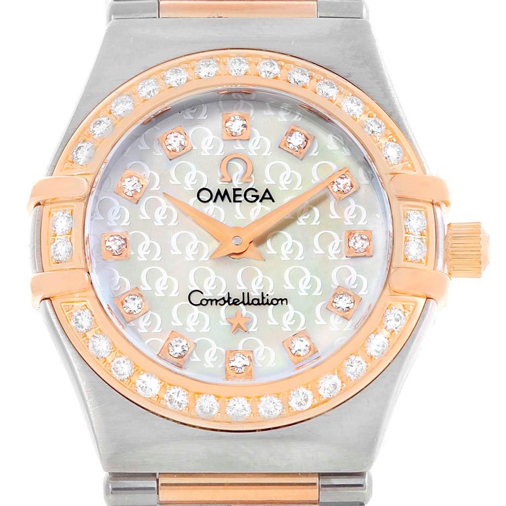The image shows a top view of the Omega 1360.75.00 Women's Steel and Gold (two tone) Mother of Pearl Dial 1360.75.00 Women's Steel and Gold (two tone) Mother of Pearl Dial Constellation My Choice Mini Diamond Watch 1360.75.00, highlighting the dial, bezel, and crown.