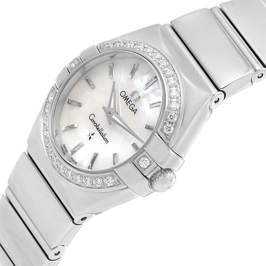 The image shows a close-up view of the Omega 123.15.24.60.05.002 Women's Stainless Steel Mother of Pearl Dial 123.15.24.60.05.002 Women's Stainless Steel Mother of Pearl Dial Constellation MOP Diamond Ladies Watch 123.15.24.60.05.002 dial and part of the bracelet.