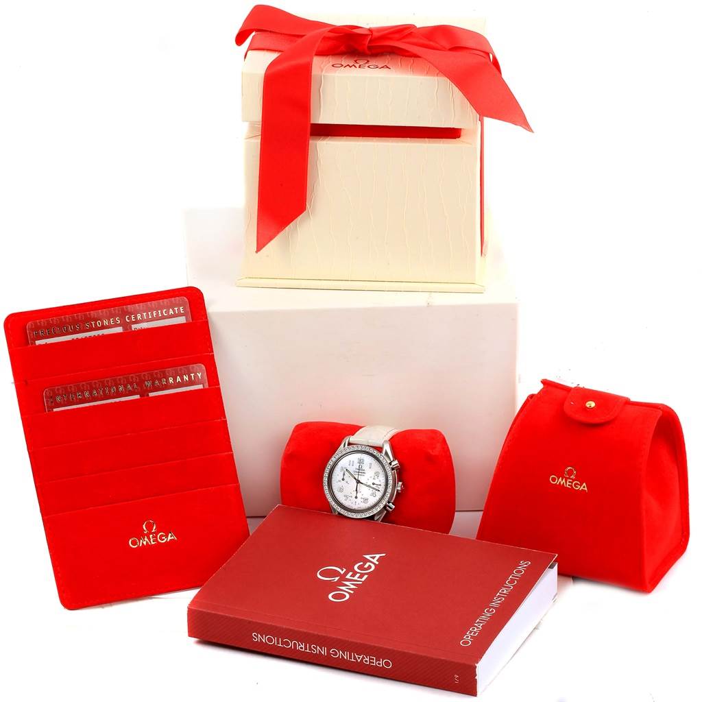 The Omega 3815.70.36 Women's Stainless Steel Mother of Pearl Dial 3815.70.36 Women's Stainless Steel Mother of Pearl Dial Speedmaster Ladies Diamond MOP Dial Watch 3815.70.36 is displayed with its box, warranty card, pouch, and instruction manual.