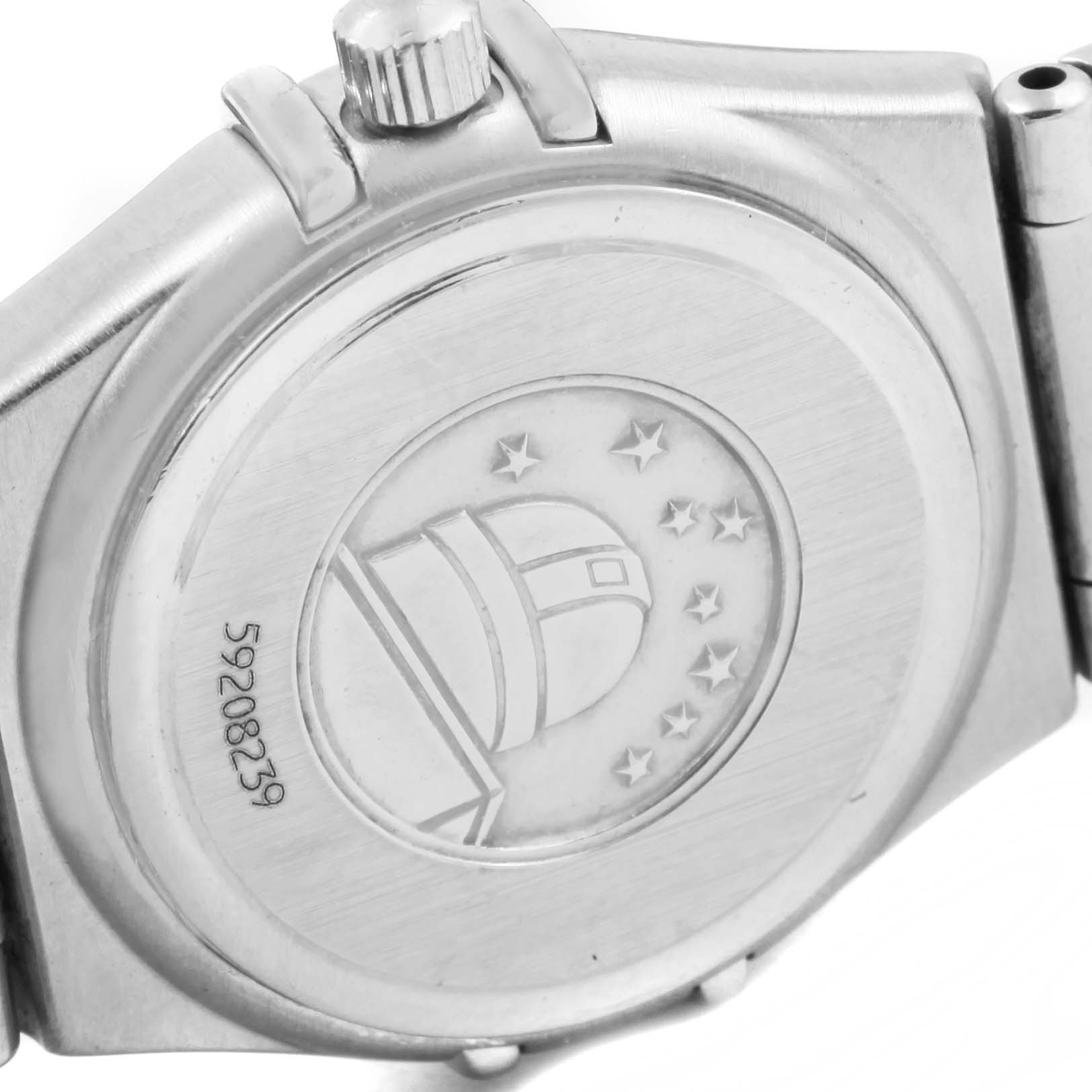 The image shows the back case and crown of the Omega 1460.75.00 Women's Stainless Steel Mother of Pearl Dial 1460.75.00 Women's Stainless Steel Mother of Pearl Dial Constellation 95 Mini Diamond Ladies Watch 1460.75.00.