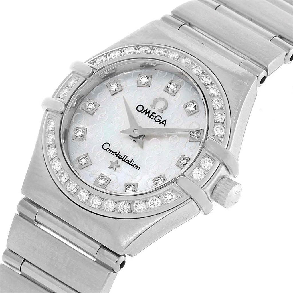 The image shows an Omega 1460.75.00 Women
s Stainless Steel Mother of Pearl Dial 1460.75.00 Women
s Stainless Steel Mother of Pearl Dial Constellation 95 Mini MOP Diamonds Ladies Watch 1460.75.00 from a slightly angled top-down view, highlighting the dial, bezel, and partially the bracelet.