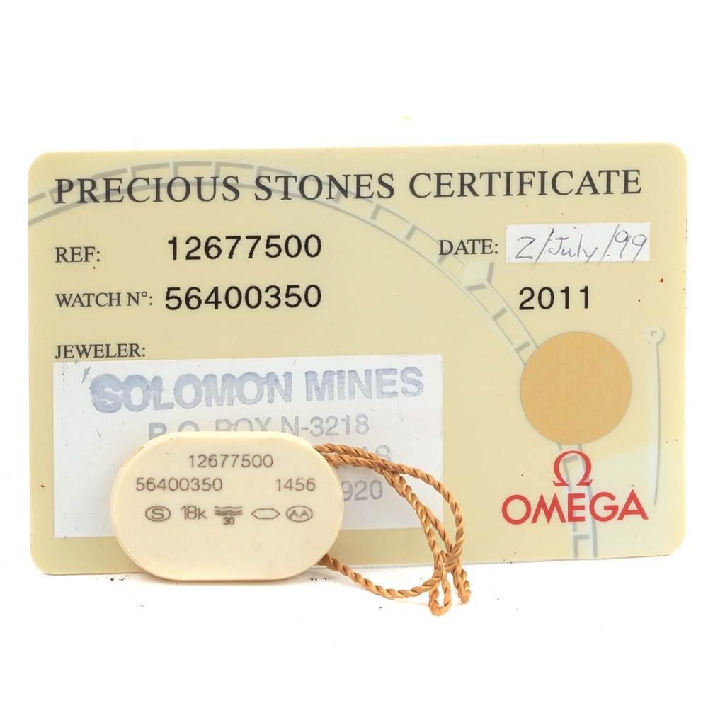 The image shows the certification card and tag for the Omega 1267.75.00 Women
s Steel and Gold (two tone) Mother of Pearl Dial 1267.75.00 Women
s Steel and Gold (two tone) Mother of Pearl Dial Constellation Mini MOP Diamond Ladies Watch 1267.75.00.