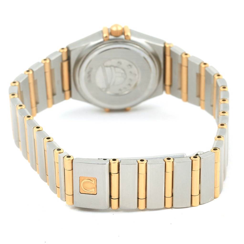 The image shows the back view of the Omega 1267.75.00 Women
s Steel and Gold (two tone) Mother of Pearl Dial 1267.75.00 Women
s Steel and Gold (two tone) Mother of Pearl Dial Constellation Mini MOP Diamond Ladies Watch 1267.75.00, highlighting its bracelet and case back.