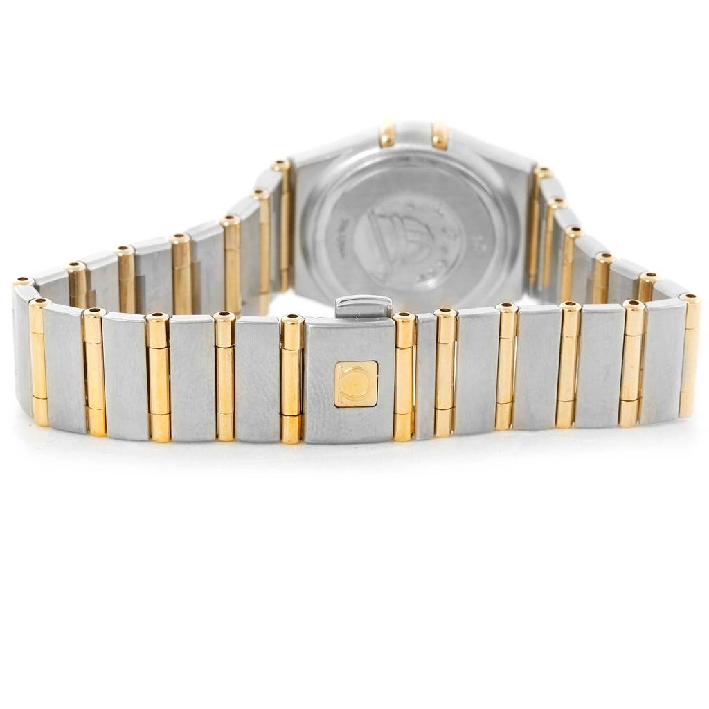 The image shows the back view of an Omega 1267.75.00 Women
s Steel and Gold (two tone) Mother of Pearl Dial 1267.75.00 Women
s Steel and Gold (two tone) Mother of Pearl Dial Constellation My Choice Mini MOP Diamond Ladies Watch 1267.75.00, highlighting the clasp and bracelet.