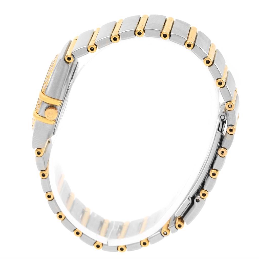 The image shows a side view of the Omega 1267.75.00 Women
s Steel and Gold (two tone) Mother of Pearl Dial 1267.75.00 Women
s Steel and Gold (two tone) Mother of Pearl Dial Constellation My Choice Mini MOP Diamond Ladies Watch 1267.75.00, highlighting its band and case.