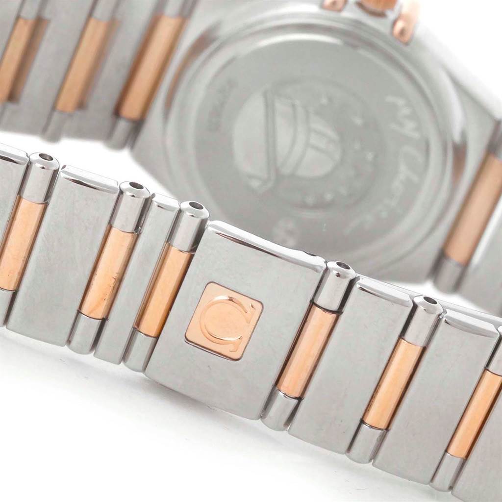 The image shows the back and partially the bracelet of the Omega 1368.71.00 Women's Steel and Gold (two tone) Mother of Pearl Dial 1368.71.00 Women's Steel and Gold (two tone) Mother of Pearl Dial Constellation My Choice Mini Diamond Ladies Watch 1368.71.00.