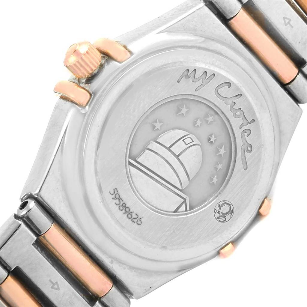 The image shows the back of the Omega 1368.71.00 Women's Steel and Gold (two tone) Mother of Pearl Dial 1368.71.00 Women's Steel and Gold (two tone) Mother of Pearl Dial Constellation My Choice Mini Diamond Ladies Watch 1368.71.00 with its caseback and crown details.