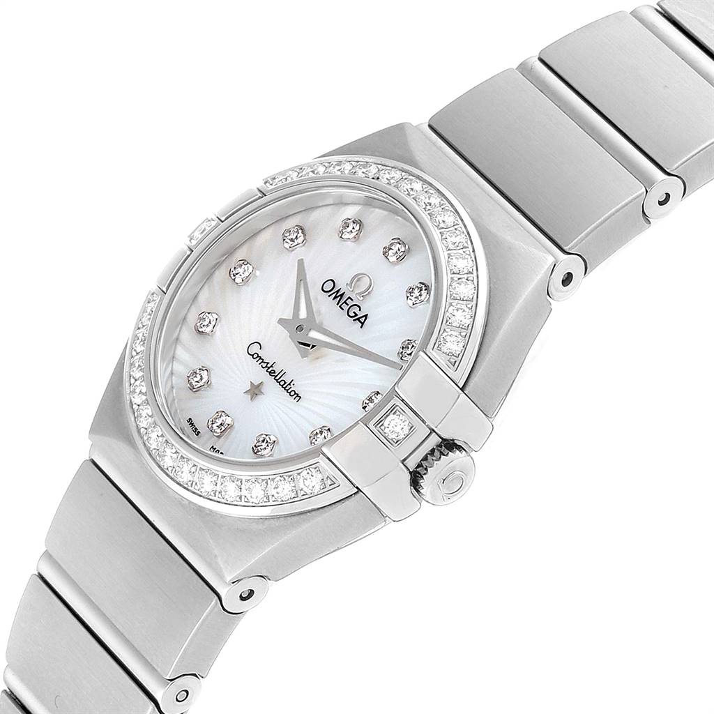 The image shows an angled view of the Omega 123.15.24.60.55.004 Women's Stainless Steel Mother of Pearl Dial 123.15.24.60.55.004 Women's Stainless Steel Mother of Pearl Dial Constellation Steel MOP Diamond Watch 123.15.24.60.55.004, highlighting the face, bezel, and bracelet.