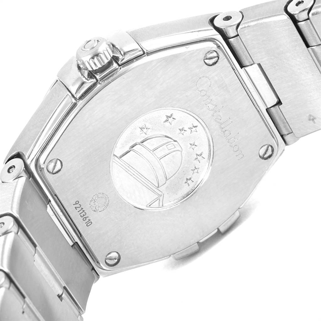 This image shows the back casing and part of the bracelet of the Omega 123.15.24.60.55.004 Women's Stainless Steel Mother of Pearl Dial 123.15.24.60.55.004 Women's Stainless Steel Mother of Pearl Dial Constellation Steel MOP Diamond Watch 123.15.24.60.55.004 Unworn model.