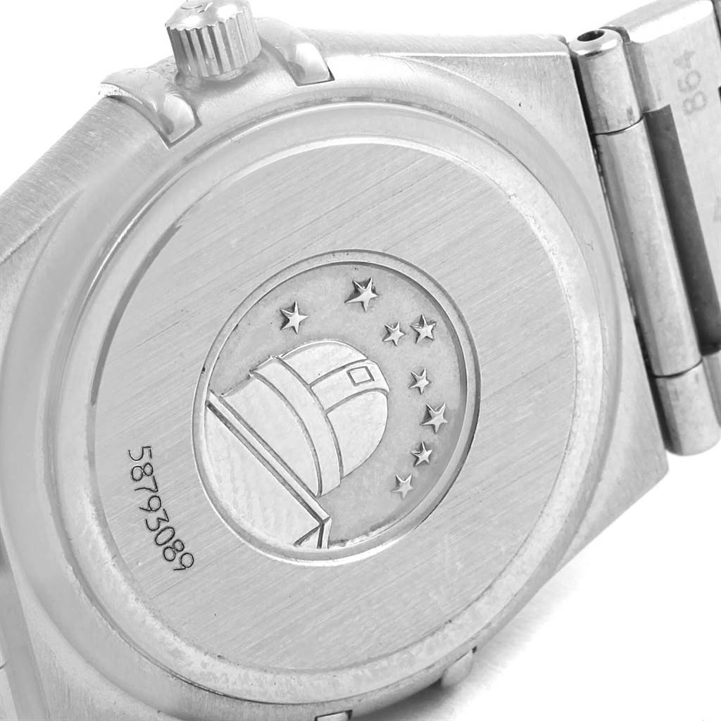 The image shows the case back and part of the bracelet of an Omega 1460.75.00 Women's Stainless Steel Mother of Pearl Dial 1460.75.00 Women's Stainless Steel Mother of Pearl Dial Constellation 95 Mini MOP Diamonds Ladies Watch 1460.75.00.