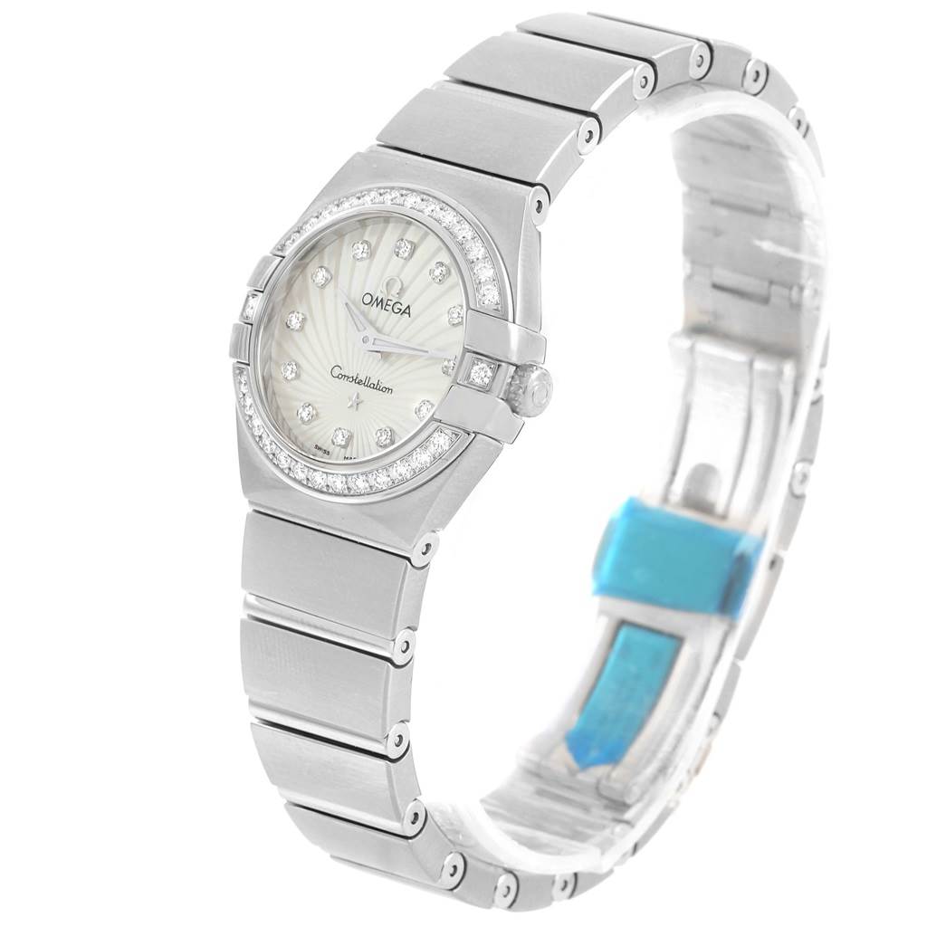 The image shows an Omega 123.15.24.60.55.004 Women
s Stainless Steel Mother of Pearl Dial 123.15.24.60.55.004 Women
s Stainless Steel Mother of Pearl Dial Constellation MOP Diamond Ladies Watch 123.15.24.60.55.004 from a front-side angle, highlighting the bracelet and bezel.