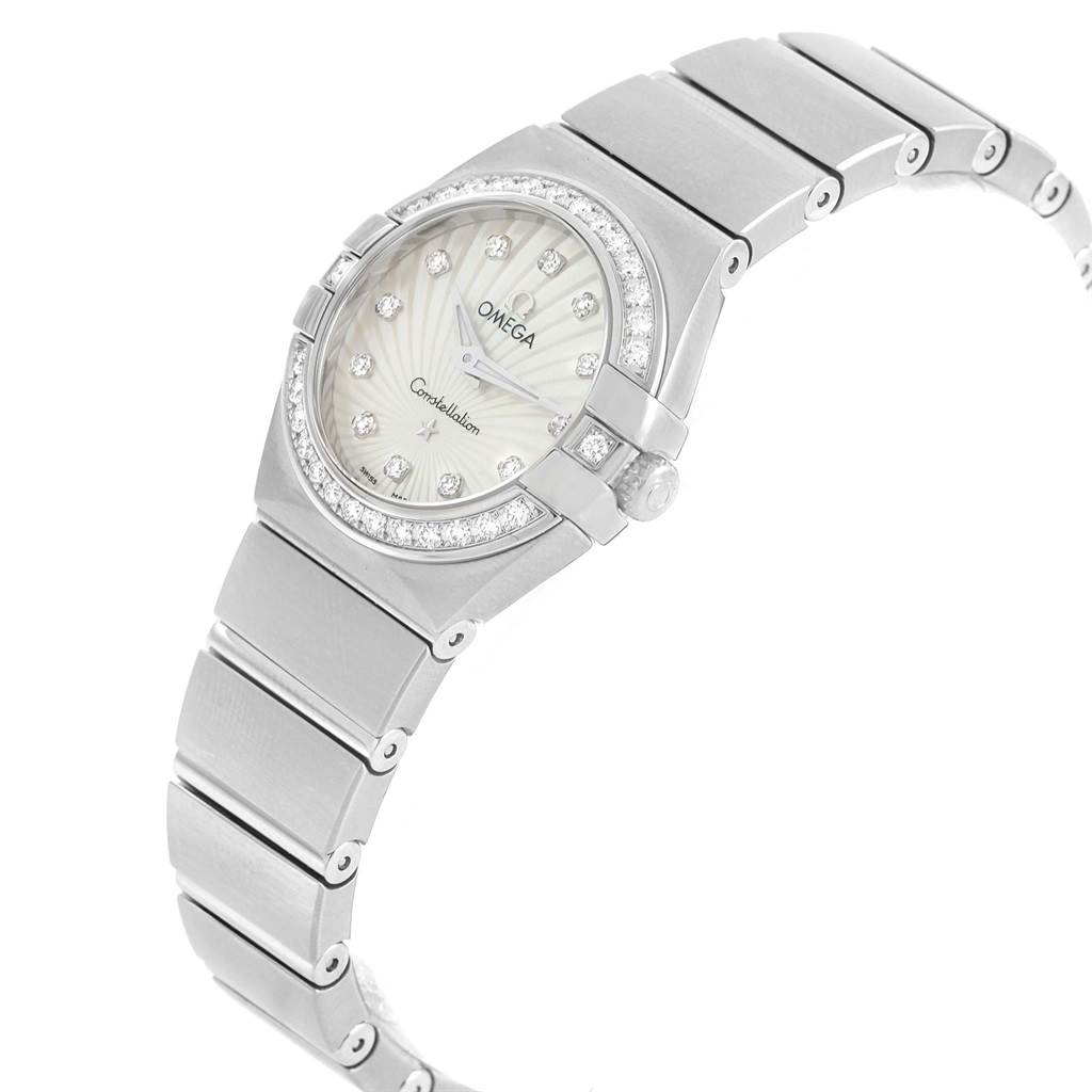 The image shows an Omega 123.15.24.60.55.004 Women's Stainless Steel Mother of Pearl Dial 123.15.24.60.55.004 Women's Stainless Steel Mother of Pearl Dial Constellation MOP Diamonds Ladies Watch model 123.15.24.60.55.004, featuring the face and bracelet from a side angle.