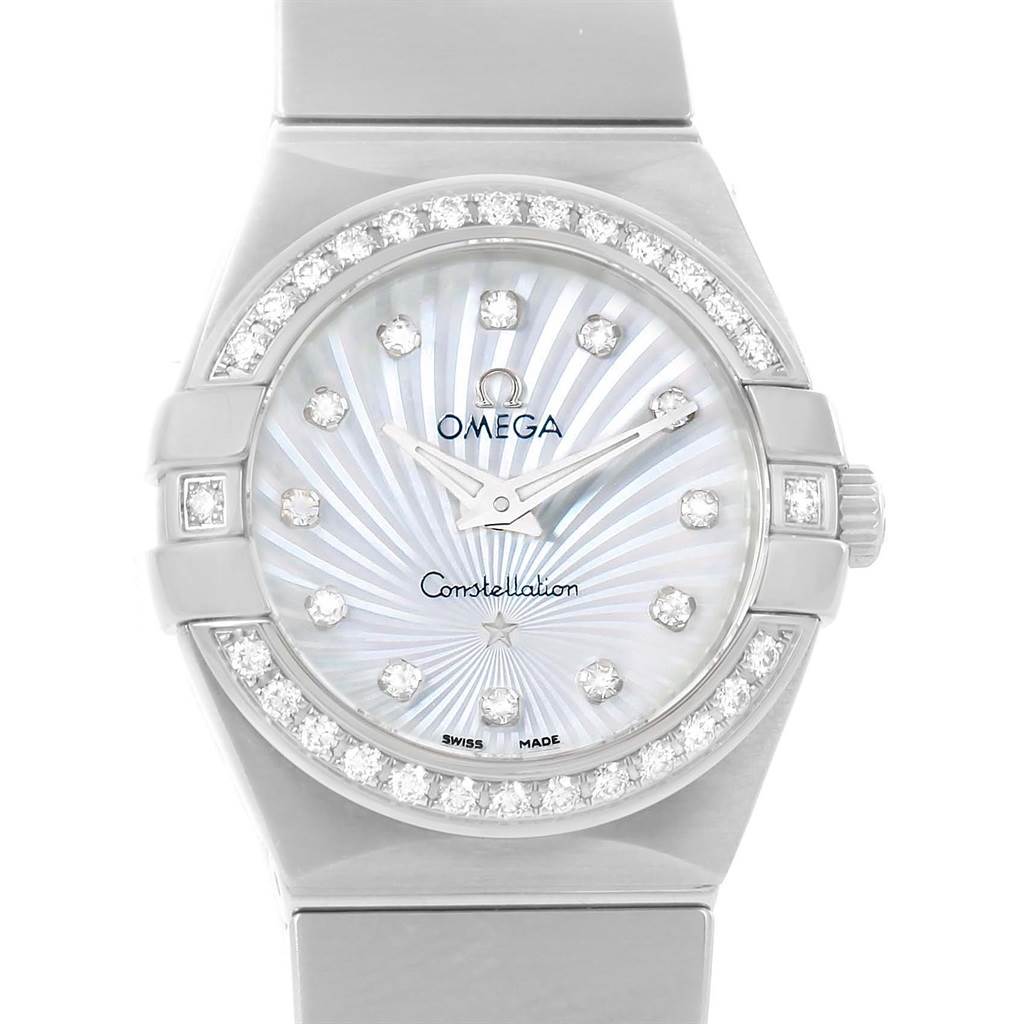 The image shows a front view of the Omega 123.15.24.60.55.004 Women's Stainless Steel Mother of Pearl Dial 123.15.24.60.55.004 Women's Stainless Steel Mother of Pearl Dial Constellation MOP Diamonds Ladies Watch 123.15.24.60.55.004, displaying its dial, bezel, and bracelet.