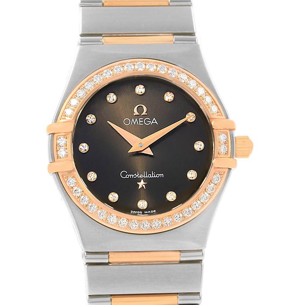 The image shows a front view of the Omega 1358.60.00 Women's Steel and Gold (two tone) Brown Dial 1358.60.00 Women's Steel and Gold (two tone) Brown Dial Constellation 95 Steel Rose Gold Diamond Watch 1358.60.00 model, highlighting the face and part of the bracelet.