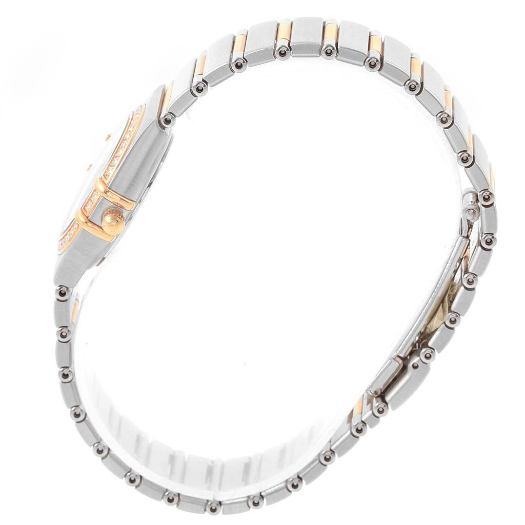 The image shows a side profile of the Omega 1358.60.00 Women's Steel and Gold (two tone) Brown Dial 1358.60.00 Women's Steel and Gold (two tone) Brown Dial Constellation 95 Steel Rose Gold Diamond Watch 1358.60.00, highlighting its band and crown.